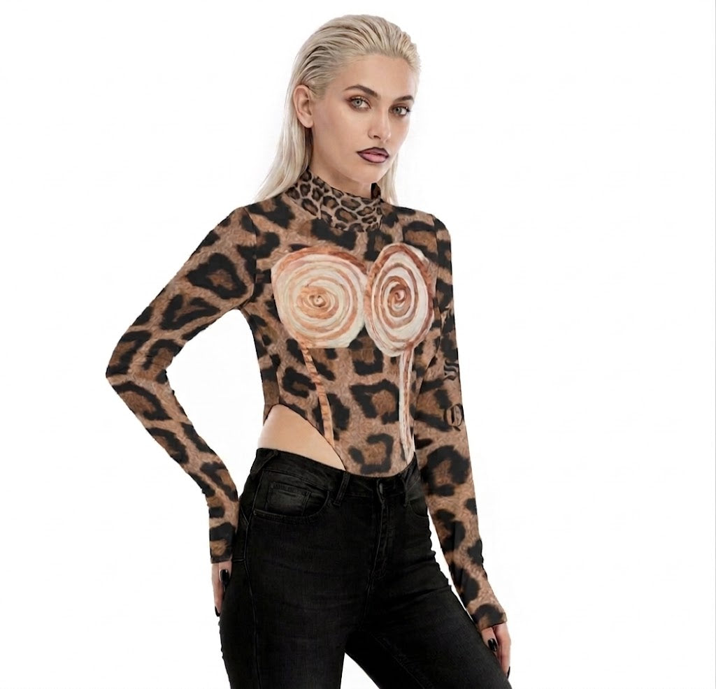 Woman wearing a leopard print long-sleeve top with floral designs on a twhite background